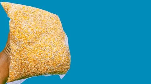 Corn in a pack for chicken feed Stock Photos