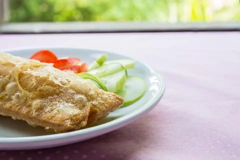 Corn pie with dish on table. Stock Photos