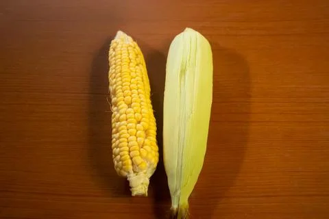Corn that is placed on the table is brown Stock Photos
