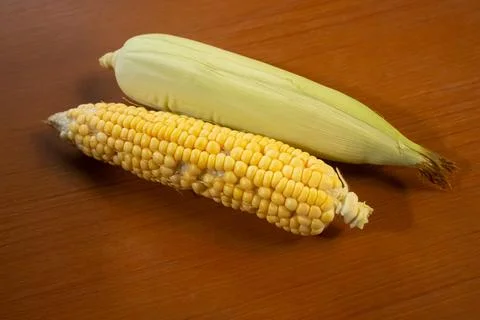 Corn that is placed on the table is brown Stock Photos