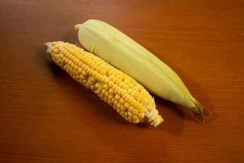 Corn that is placed on the table is brown Stock Photos