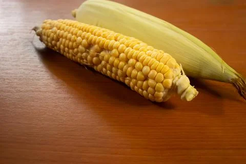 Corn that is placed on the table is brown Stock Photos