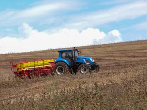 Corn planter attached to a tractor Stock Photos