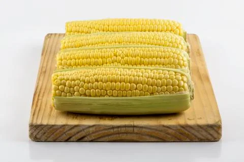 Corn on prep board 02 Stock Photos