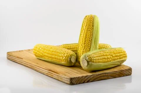 Corn on prep board 04 Stock Photos