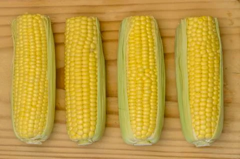 Corn on prep board top 01 Stock Photos