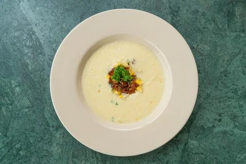 Corn soup with crispy bacon Stock Photos