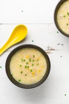 Corn soup vertical top view. Stock Photos