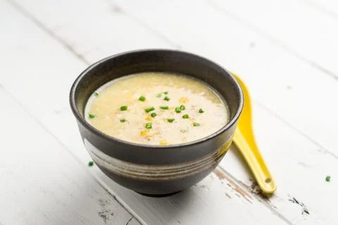 Corn soup on white background. Stock Photos