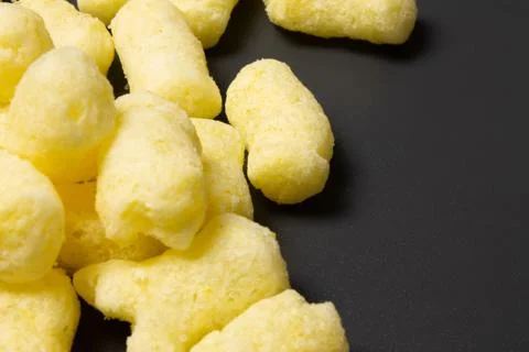 Corn sticks close-up on a dark background Foto stock