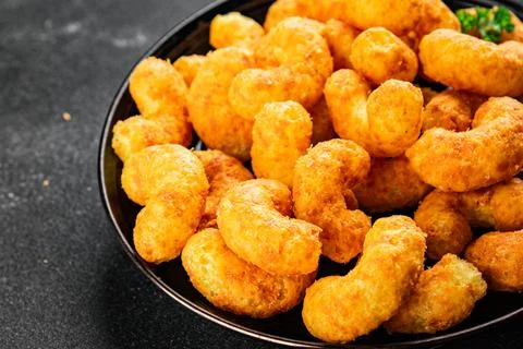 Corn sticks or chips, salty appetizer bacon flavor food dish tasty snack fr.. Stock-Fotos