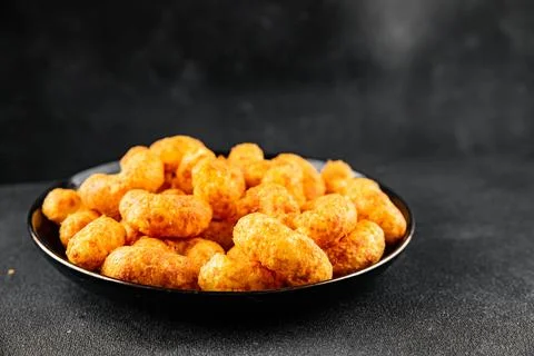 Corn sticks or chips, salty appetizer bacon flavor food dish tasty snack fr.. Stock-Fotos