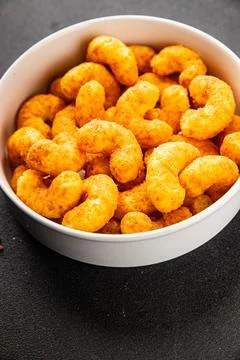 Corn sticks or chips, salty appetizer bacon flavor food dish tasty snack fr.. Stock-Fotos