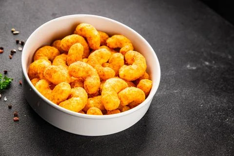 Corn sticks or chips, salty appetizer bacon flavor food dish tasty snack fr.. Stock-Fotos