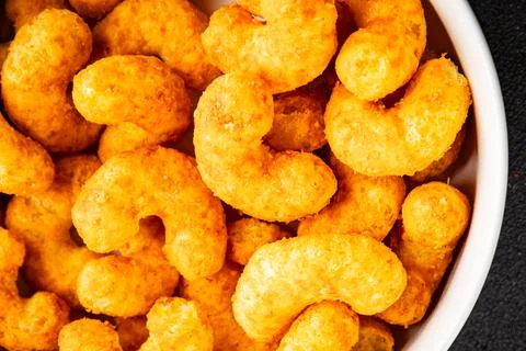 Corn sticks or chips, salty appetizer bacon flavor food dish tasty snack fr.. Stock-Fotos