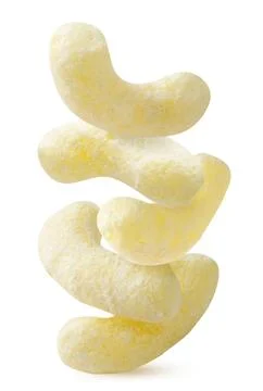 Corn sticks stand on top of each other on a white background. Isolated Stock Photos
