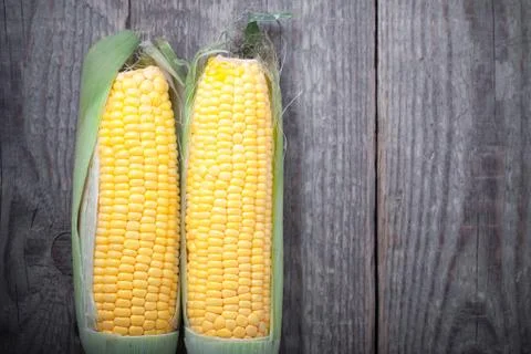Corn on wood Stock Photos