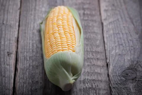 Corn on wood Stock Photos