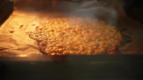 Cornbread baking in oven on baking sheet Stock Footage 316482611