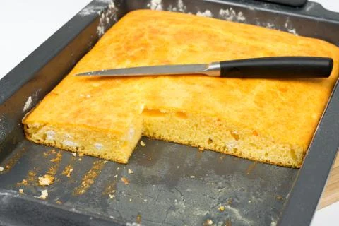 Cornbread slices with knife Stock Photos