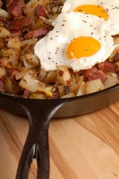 Corned beef hash and egg breakfast Stock Photos