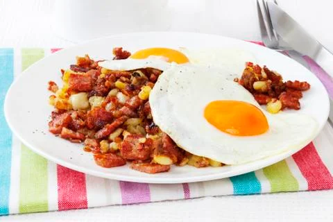 Corned beef hash with eggs plated Stock Photos