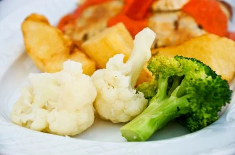 Corned beef with potatoes, broccoli and cauliflower Stock Photos