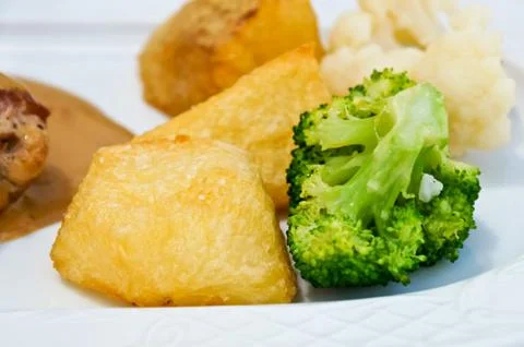 Corned beef with potatoes, broccoli and cauliflower Stock Photos