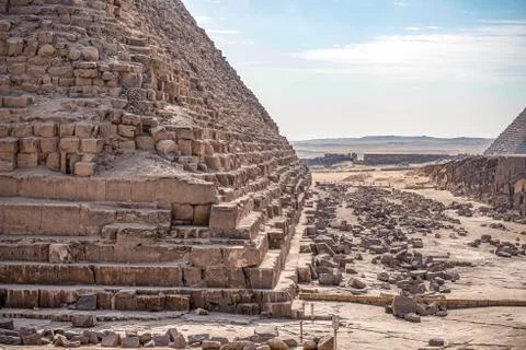 Corner of the ancient pyramid of Cheops with huge blocks of stone of which it Stock Photos