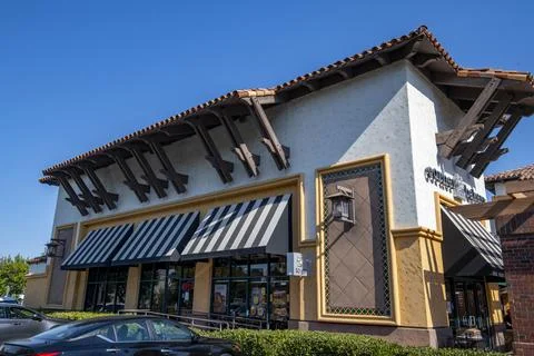 Corner Bakery Cafe store front entrance, marquee, logo, sign, stripped canopies Stock Photos