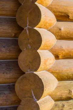 Corner of blockhouse from logs. Texture of logs from the wooden house. Stock Photos