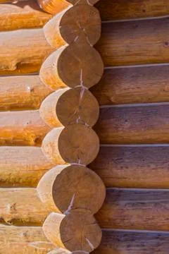 Corner of blockhouse from logs. Texture of logs from the wooden house. Stock Photos