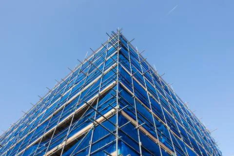 Corner of blue scaffolding Stock Photos