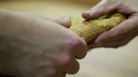 Corner Bread open up bigger rip Stock Footage 9482819