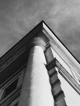 Corner of a building column against the sky. Stock Photos