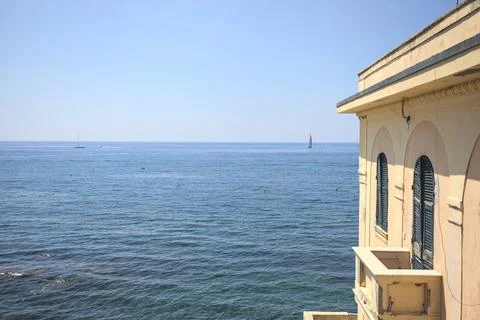 Corner of a building by the sea Stock Photos