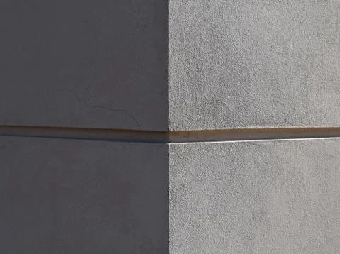 Corner of the building, two sides-sun and shadow. Stock Photos