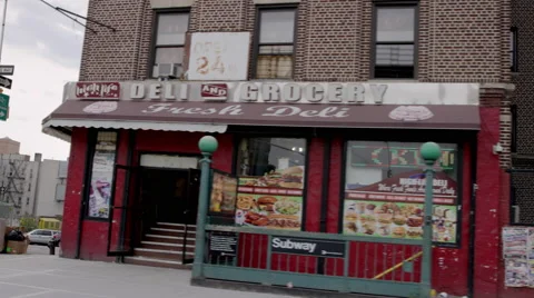 Corner deli on the Grand Concourse in the Bronx, driving past Tremont Ave 4K NYC Stock Footage 52326176
