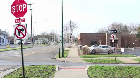 Corner of First Street and W. Michigan Avenue at Stop Sign, Jackson, MI.mp4 Stock Footage 22771750