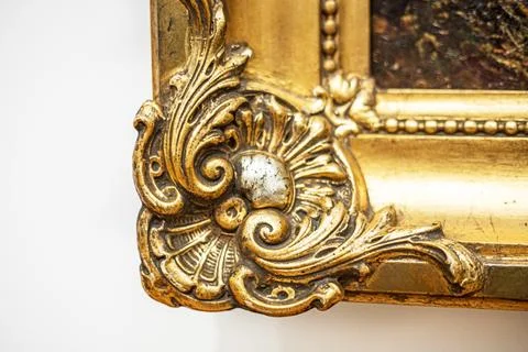Corner of the gilded relief frame profile Stock Photos