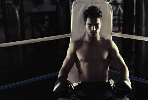 Corner, man and boxing ring for sports, resting or training for competition in Stock Photos