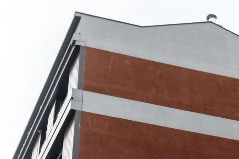 A corner from a modern building with red bricks - white background Stock Photos