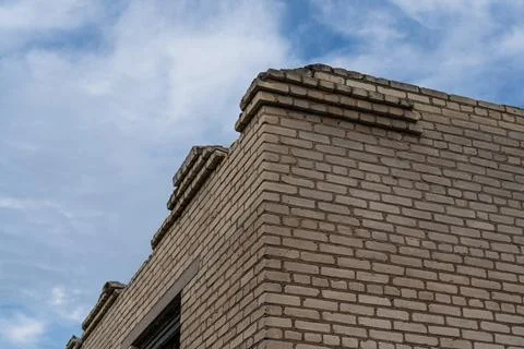 Corner of an old, abandoned, brick store building in the village Stock Photos