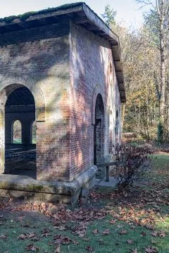 The corner of an old park building in fall Stock Photos