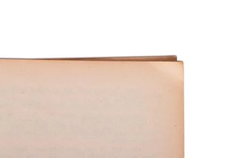 Corner of open book Stock Photos