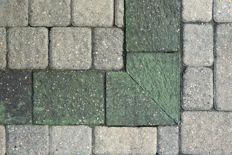 Corner pattern in grey brick paving Foto stock