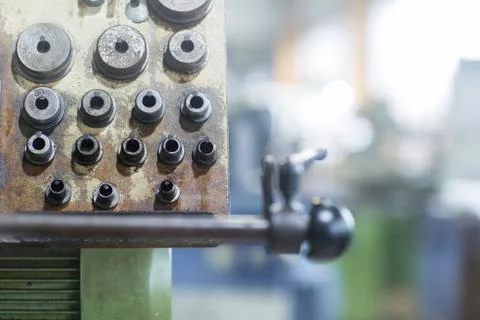 Corner section of machinery in grinding workshop Stock Photos