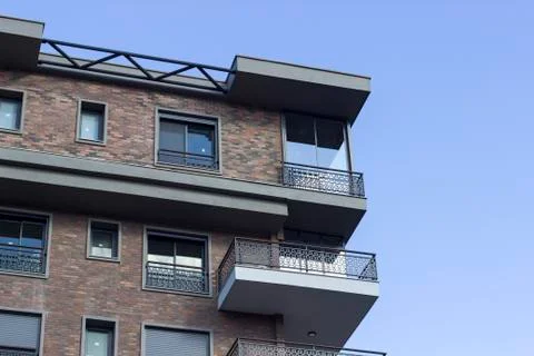 Corner shot of brick design wall of modern building in the city Stock Photos