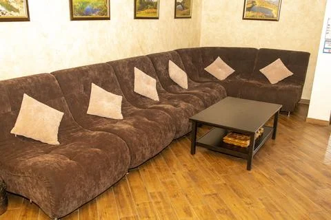 Corner sofa in the corridor Stock Photos