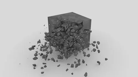 The corner of the stone gray cube beats off. The fragments fly apart and jump on Stock Footage 127611097